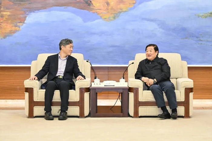 谭旭光与清华大学李稻葵一行进行工作座谈2.jpg